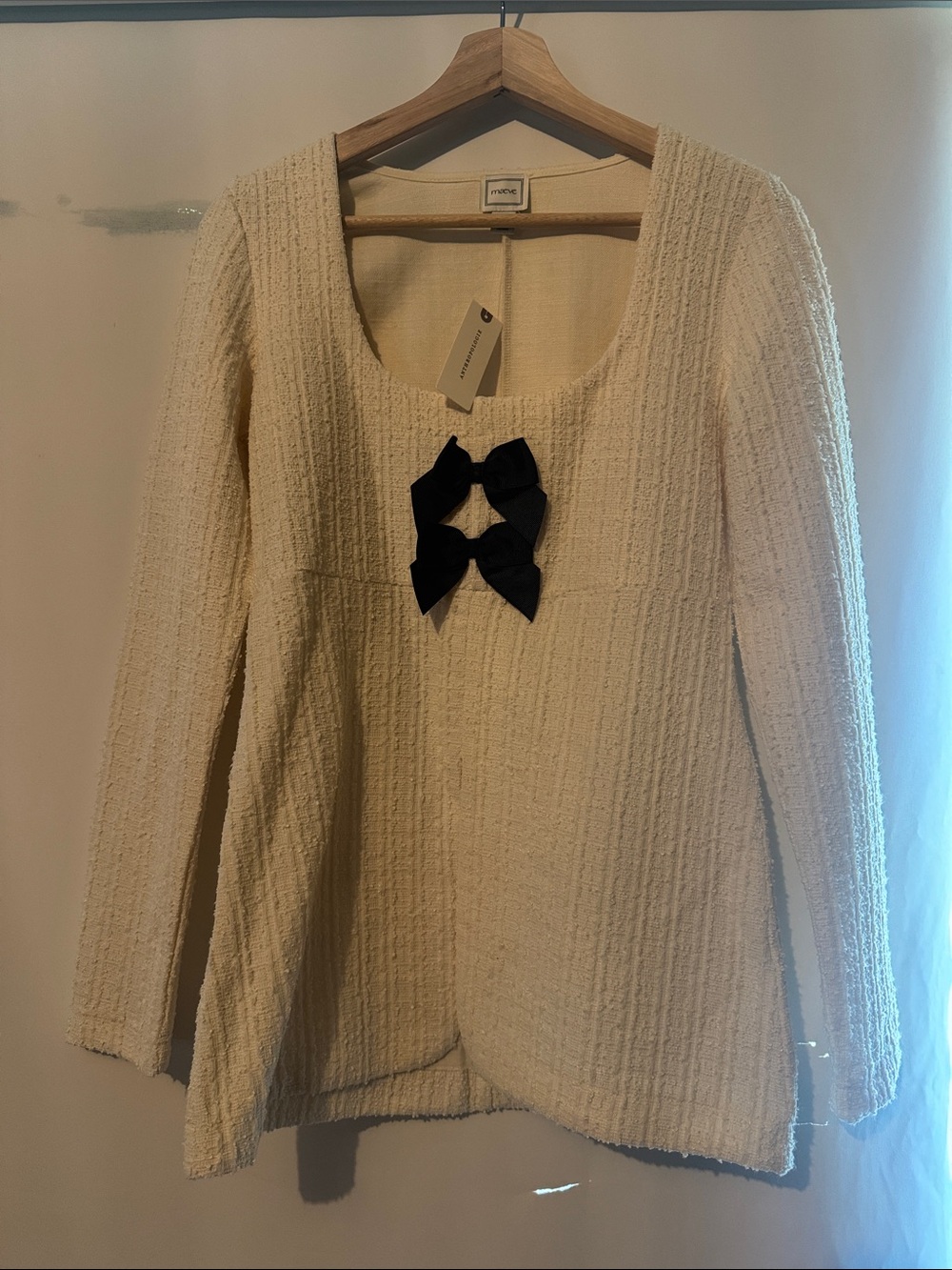 Anthropologie Cream Textured Long-Sleeve Top with Black Bows